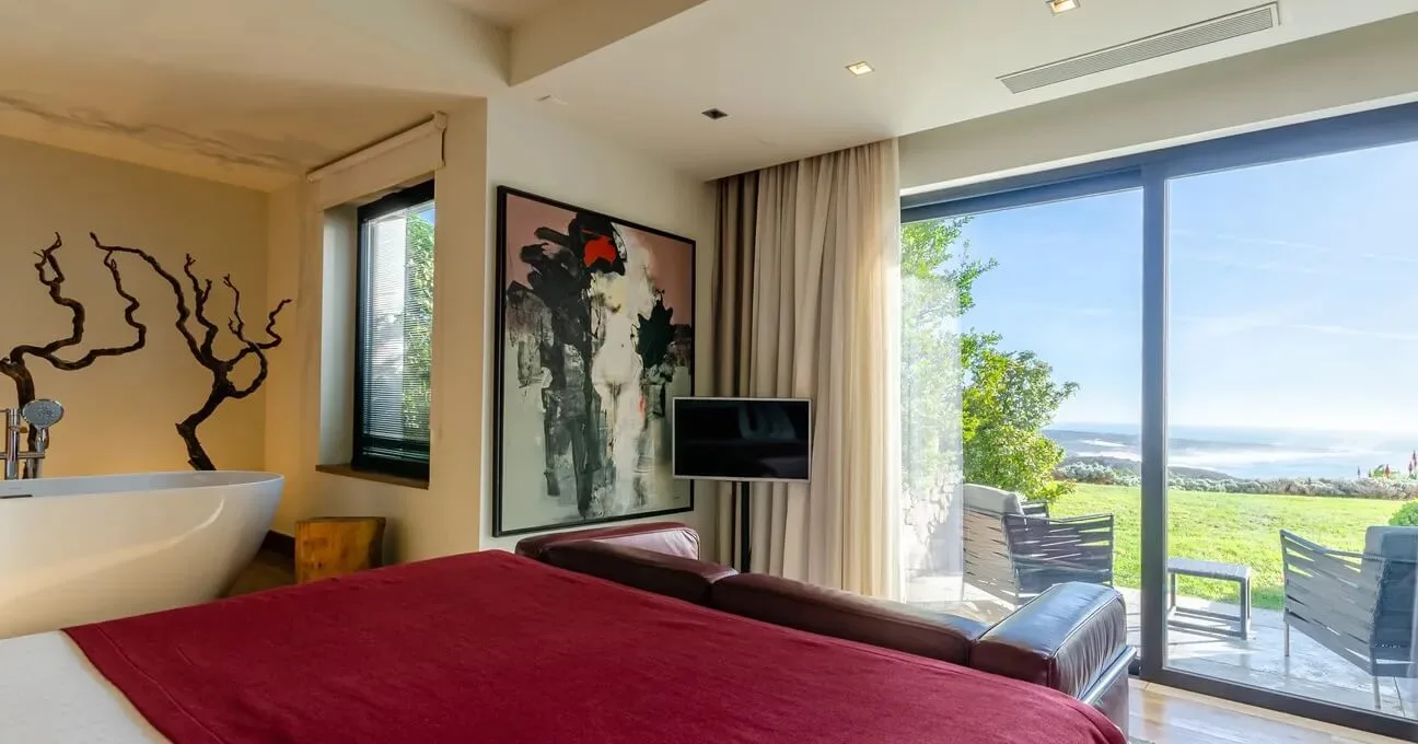 Large windows overlooking the vineyards from the Pinot Noir Room
