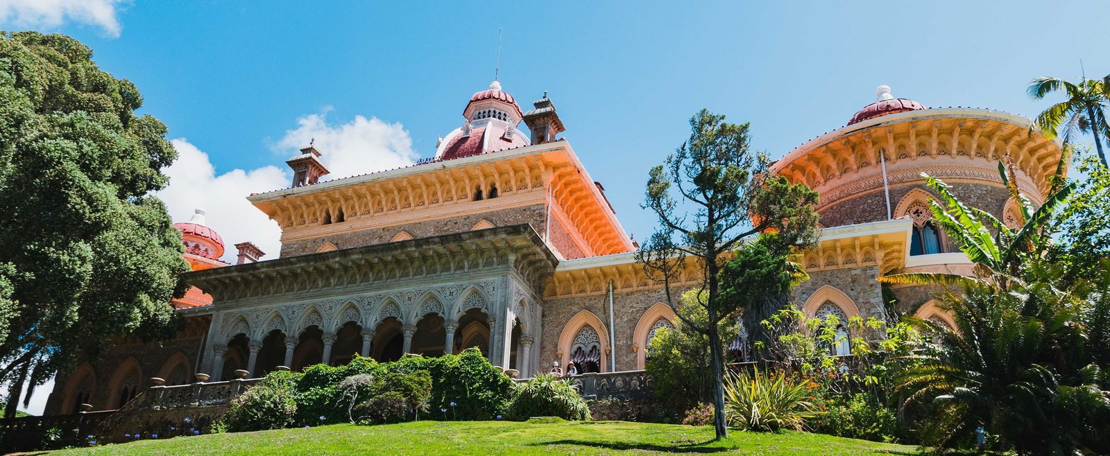 Monserrate Palace surrounded by lush botanical gardens and exotic plants in Sintra, Portugal